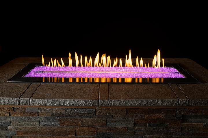 Fire pit with glowing flames and a dark background