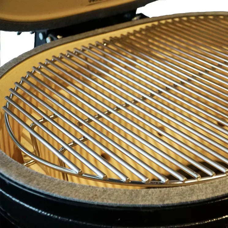 Closeup picture of a round gas grill.