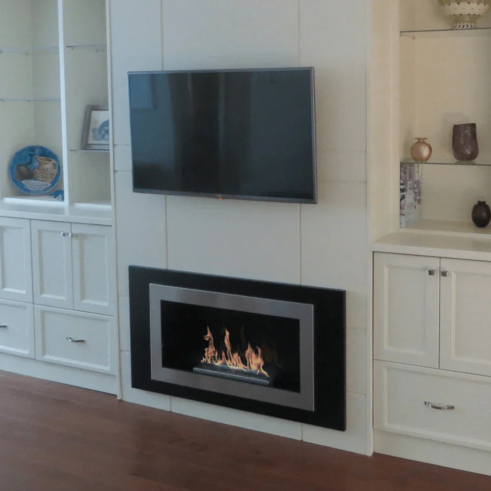 wall mounted fireplace with tv on top