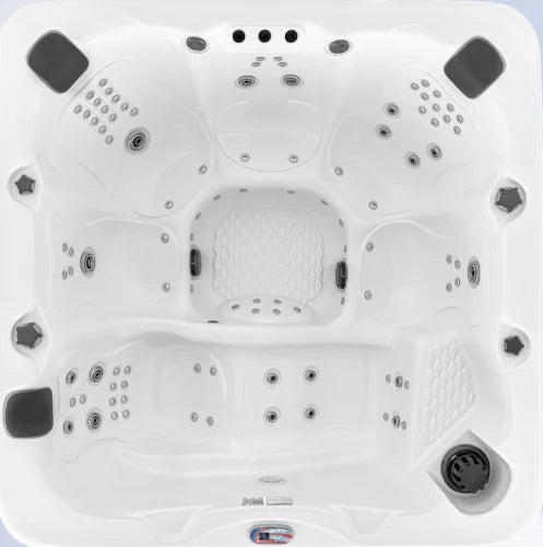 American Spas 6-Person Lounger Spa featuring 100 exclusive Halo stainless steel jets for full-body hydrotherapy and relaxation, complete with multi-colored LED lighting and Bluetooth stereo system.