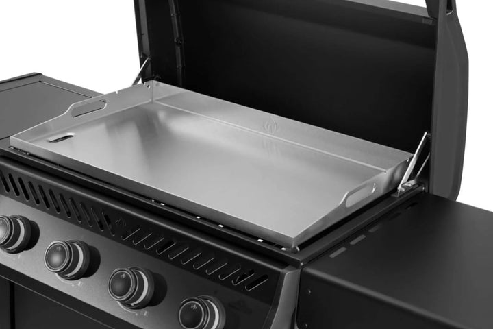 Napoleon Rogue PRO Phantom 30 Inch Griddle: rugged matte black finish, 430 stainless steel cooktop for superior heat retention, even heat distribution, and long-lasting durability, 4 main burners with 33,600 BTU output, ergonomic design with white backlit control knobs and folding side shelves.