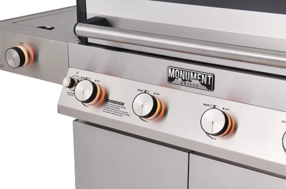 Monument Grills Denali Series D405 Stainless Steel 4-Burner Gas Grill with Digital Touchscreen, Color-Changing LED Knobs, ClearView Lid and Bluetooth Connectivity.