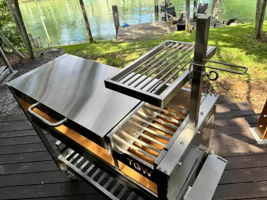 Tagwood Freestanding Santa Maria Style Grill - Stainless Steel, premium 304 stainless steel construction, large 705 sq. in. cooking surface with dual preset grate positions and brasero firebox for live-fire cooking versatility.