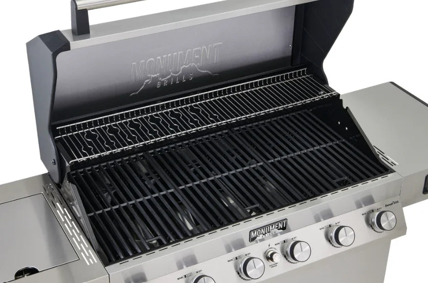 Monument Grills Denali Series D605 Gas Grill - A premium stainless steel grill featuring six high-output burners, 84,000 BTU total heat system, and advanced features like Bluetooth connectivity, digital touchscreen interface, and color-changing LED backlit knobs for a modern grilling experience.