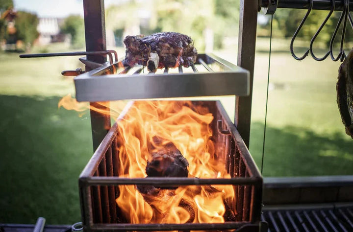 Tagwood BBQ Argentine Santa Maria Wood Fire & Charcoal Gaucho Grill features #304 stainless steel construction, four distinct cooking zones, height-adjustable main grate, and S-shape meat hooks for authentic Argentine grilling experience.