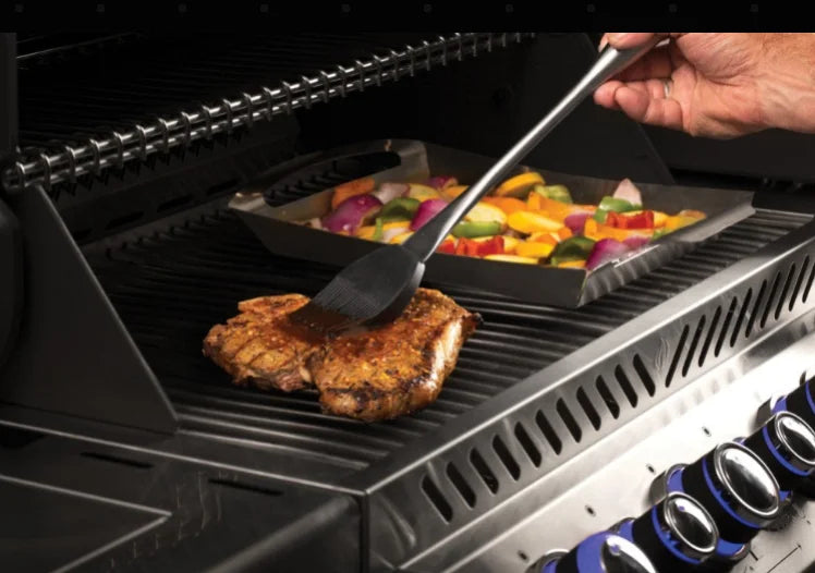 Napoleon PRO Stainless Steel 3-Piece Toolset featuring locking tongs, multifunctional spatula, and silicone basting brush for effortless grilling.