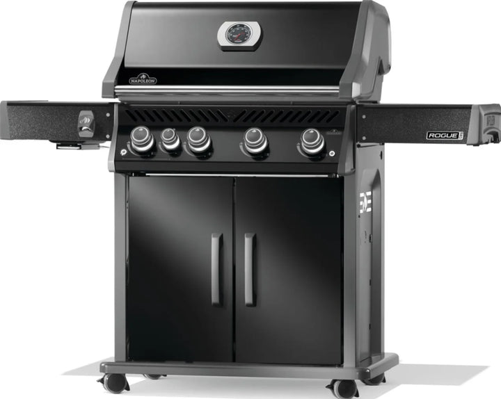 Napoleon Rogue PRO 525 Black Gas Grill with Infrared SIZZLE ZONE side burner, featuring four main burners, porcelainized cast iron cooking grids, and durable black finish for professional-grade performance in outdoor grilling.