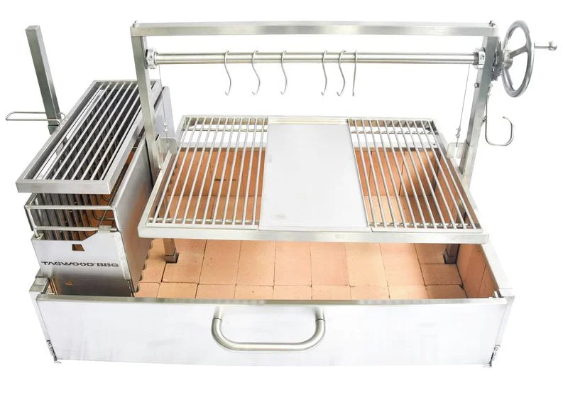Tagwood XL Built-In Santa Maria Style Grill: Durable #304 stainless steel construction, 1,103 sq. in. grilling area, height-adjustable main grate and secondary grate over firebox with S-shape meat hooks for authentic Argentine open-fire cooking experience.
