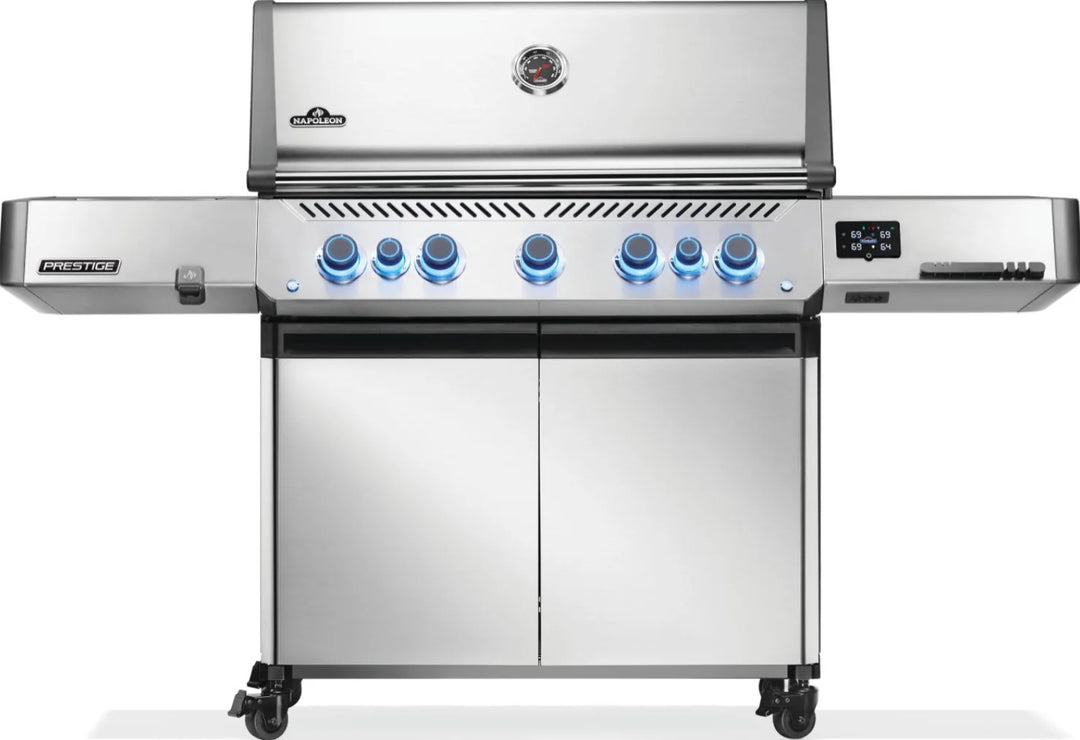 Napoleon Prestige 665 Series Gas Grill in stainless steel with chrome accents, featuring 7 burners, infrared rear rotisserie burner, SIZZLE ZONE side burner, and 94,000 BTUs of cooking power.