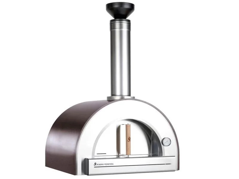 Copper Forno Venetzia "Pronto 200" countertop oven features bold red finish, signature chimney cap, oak door handle, and fire brick hearth for authentic Italian wood-fired cooking with modern design and precise temperature control.