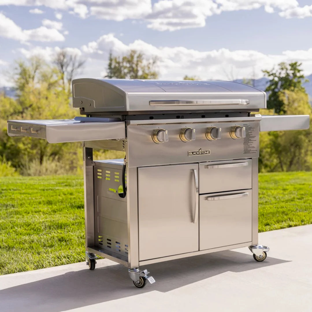 Blackstone Select 36” SS Griddle with Cabinet featuring 304-grade stainless steel, four independently controlled burners, and patented Omnivore Griddle Plate Technology for even heat distribution and quick preheat/recovery times.