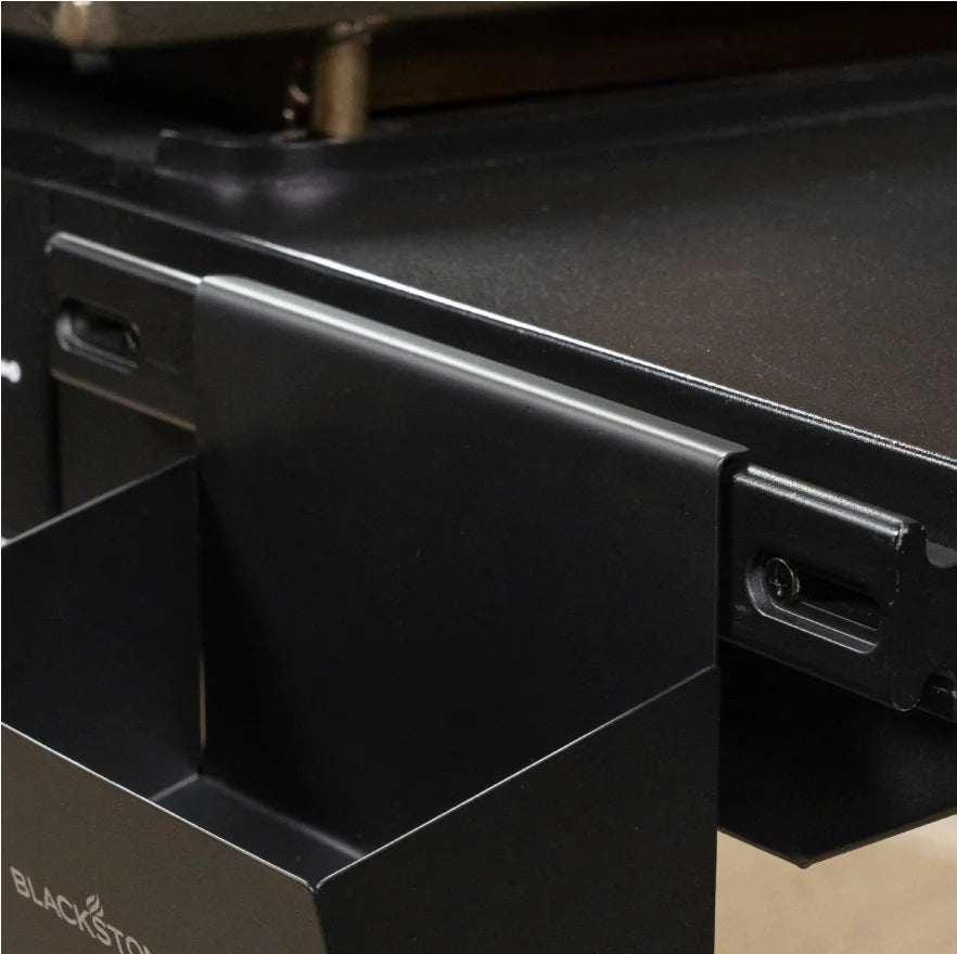 Blackstone Original 28-Inch Griddle with Hard Cover features 28-inch Omnivore Griddle Plate for faster preheating and even heat distribution, dual side shelves, electric push-button ignition, and rear grease management system for easy cleanup.