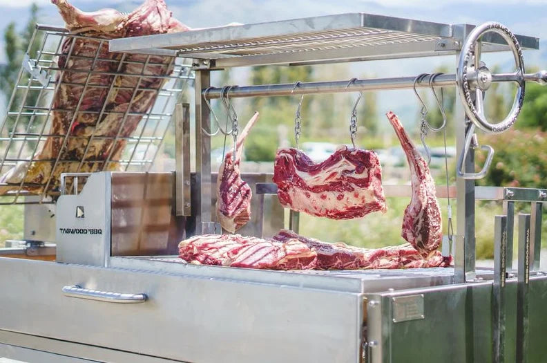 Tagwood XL Freestanding Argentine Santa Maria Style Grill, stainless steel construction, 2,600 sq. in. grilling space across five zones.