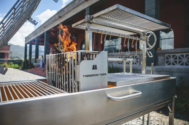 Tagwood XL Freestanding Argentine Santa Maria Style Grill, stainless steel construction with 5 distinct grilling areas totaling 2,600 sq. in.