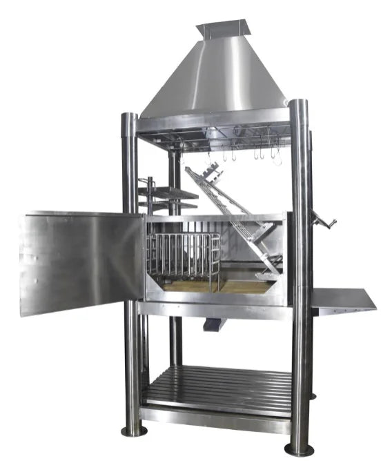 Tagwood's The Silver Bullet stainless steel Santa Maria grill features rugged 304 stainless steel construction, six cooking surfaces, and height-adjustable grates for authentic open-fire grilling experience.