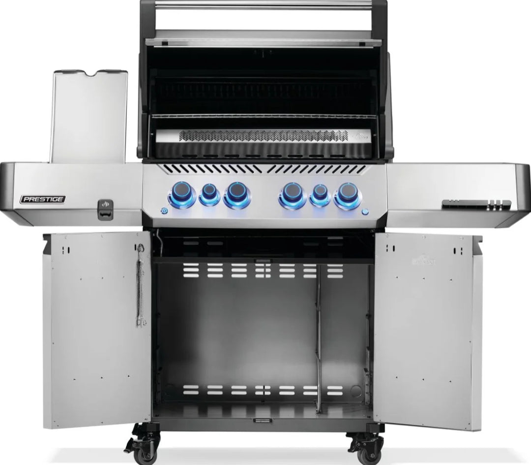 Napoleon Prestige 500 Series RSIB Gas Grill: Sleek stainless steel design, powerful infrared burners, heavy-duty rotisserie kit, stow-away warming rack and LED Spectrum NIGHT LIGHT control knobs with SafetyGlow.
