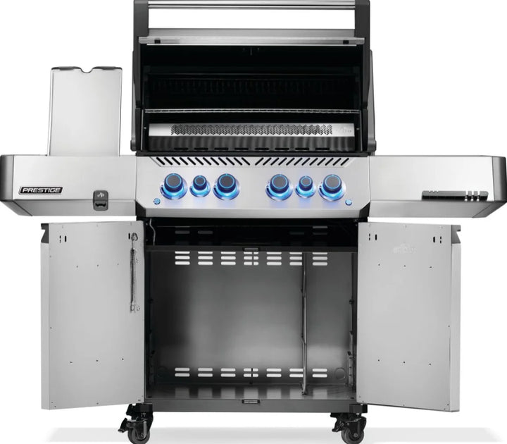 Napoleon Prestige 500 Series RSIB Gas Grill: Sleek stainless steel design, powerful infrared burners, heavy-duty rotisserie kit, stow-away warming rack and LED Spectrum NIGHT LIGHT control knobs with SafetyGlow.