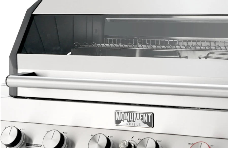 Monument Grills Denali Series D605 Pro Gas Grill - premium stainless steel construction, Blade-Infrared burner system, ceramic infrared sear burner, six high-output burners, expansive cooking area, dual-fuel capability, and precision heat control for exceptional outdoor cooking performance.