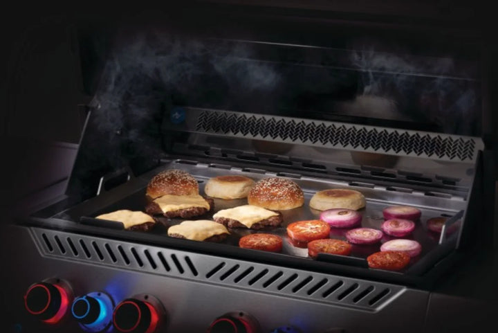 Napoleon Stainless Steel Griddle Insert, expanding cooking possibilities for Prestige PRO, Prestige, Built-In 700 Series, and Rogue 525 & 625 models, featuring even heat distribution and multiple zones for versatile griddling.