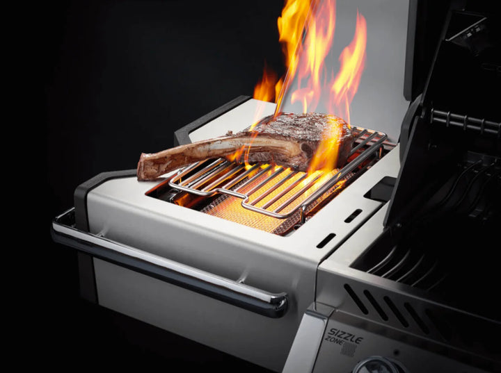 Napoleon Prestige Pro 665 gas grill features 8 burners, 1,142 sq. in. cooking space, stainless steel body, infrared SIZZLE ZONE side burner, and rotisserie kit for perfect sears and even roasting.