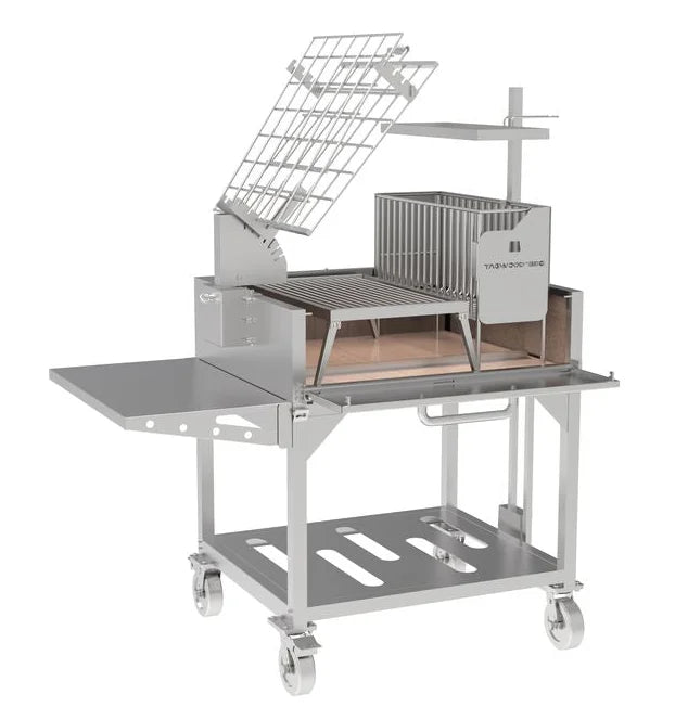 Tagwood Santa Maria Style Clamp Grill with Firebox, built from #304 stainless steel, featuring a rotating clamp grill, fixed grill box, secondary grate, firebrick-lined walls, and an integrated firebox for extended charcoal cooking sessions.