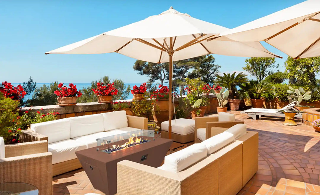 Grand Canyon 24" Tall Olympus Rectangular Fire Table, a sleek, American-made GFRC fire pit that conceals propane tank within its frame, perfect for outdoor entertaining.