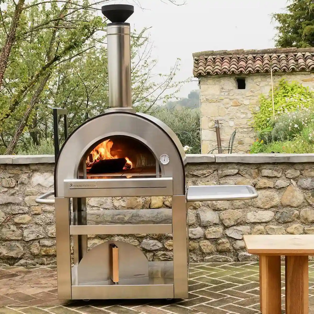 Forno Venetzia Pronto 500 Red - Authentic Italian wood-fired oven on freestanding cart for portability and convenience, cooks two pizzas at once with firebrick hearth and ceramic insulation.