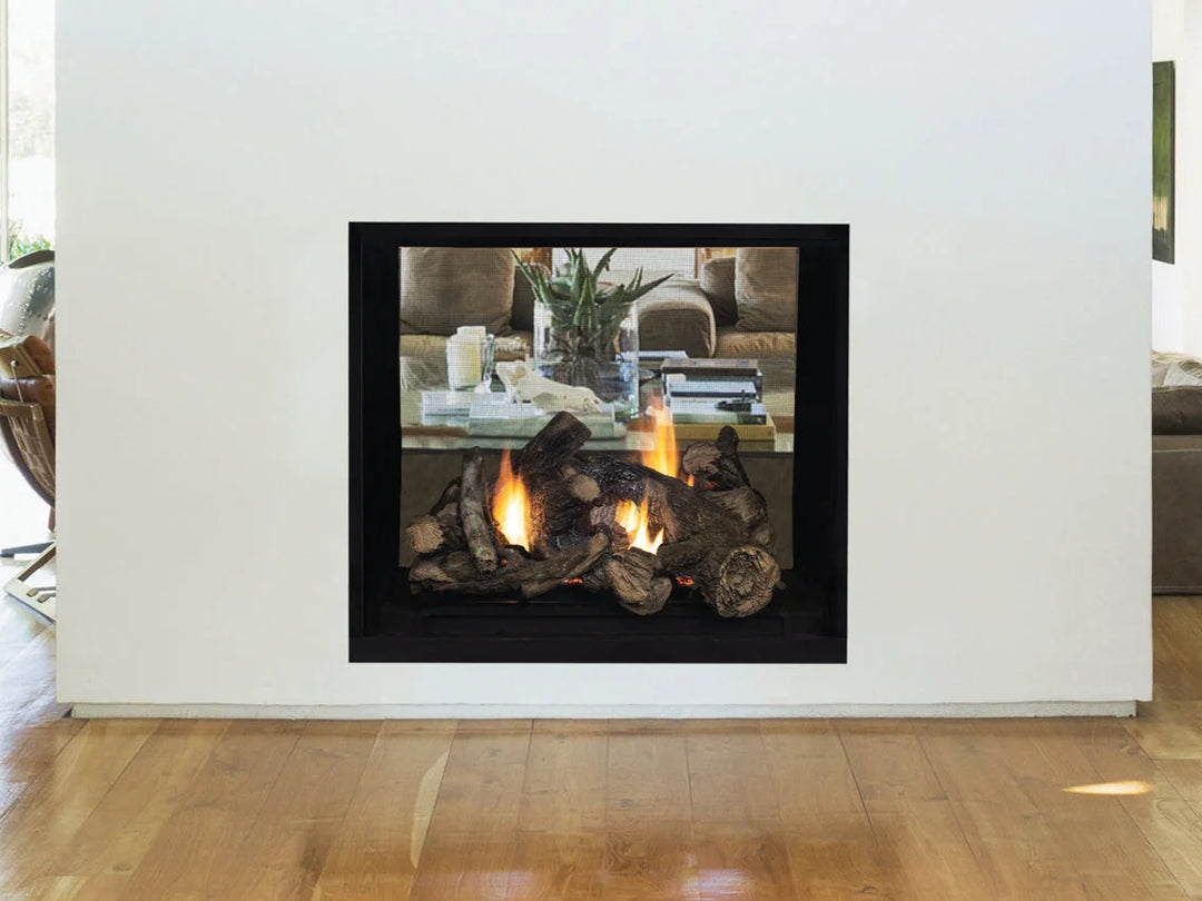 Superior 40" See-Through Direct Vent Gas Fireplace featuring expansive ceramic glass viewing area with protective screen and powerful flames over realistic aged oak log set.