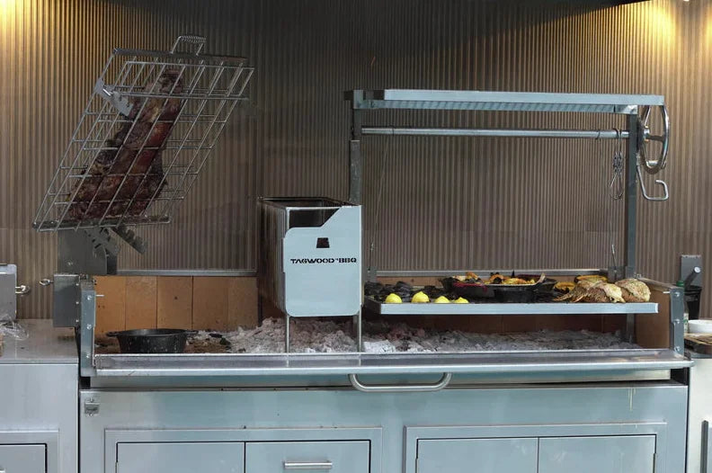 Tagwood 2XL Built-In Santa Maria Style Grill featuring premium 304 stainless steel construction, five distinct cooking zones, and over 2,600 sq. in. of grilling space.