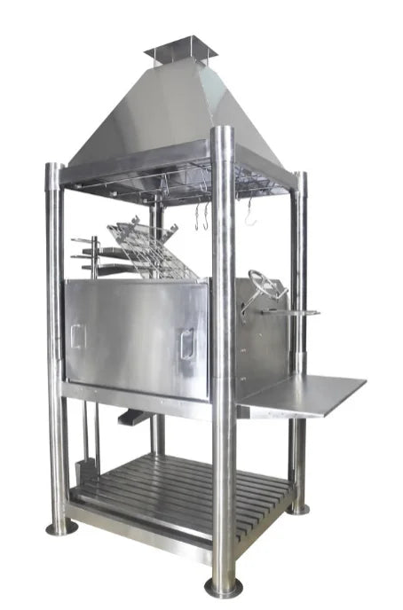 Tagwood 'The Silver Bullet' Santa Maria Style Grill - Stainless Steel, featuring six cooking surfaces, built-in firebox, firebrick insulation, and height-adjustable systems for 360° open-fire grilling experience in 304 stainless steel construction.