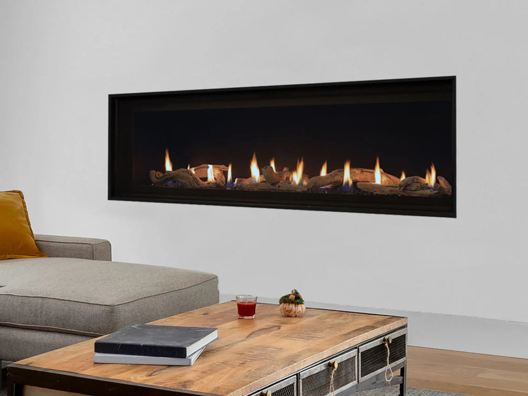 Superior DRL4000 Series Linear Direct Vent Gas Fireplace in sleek modern design with expansive ceramic glass viewing area, reflective black crushed glass media, and electronic ignition.