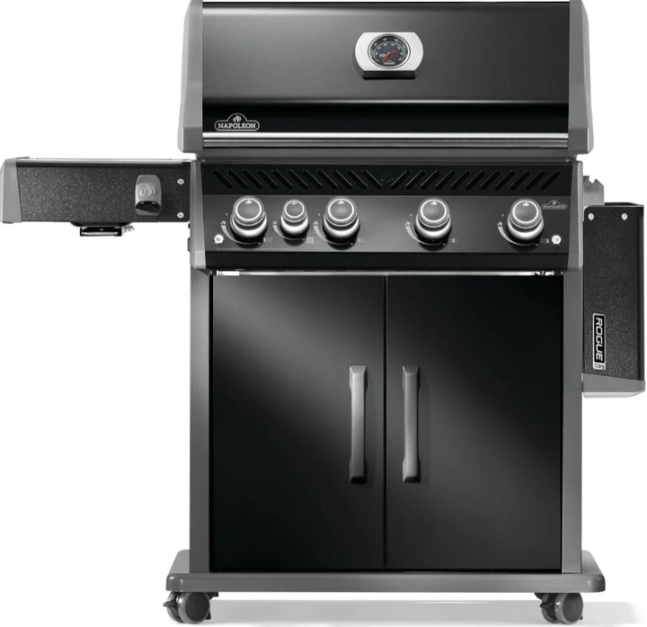 Napoleon Rogue PRO 525 gas grill features black porcelain enamel lid, infrared side burner, and large cooking area for searing, roasting, or smoking.