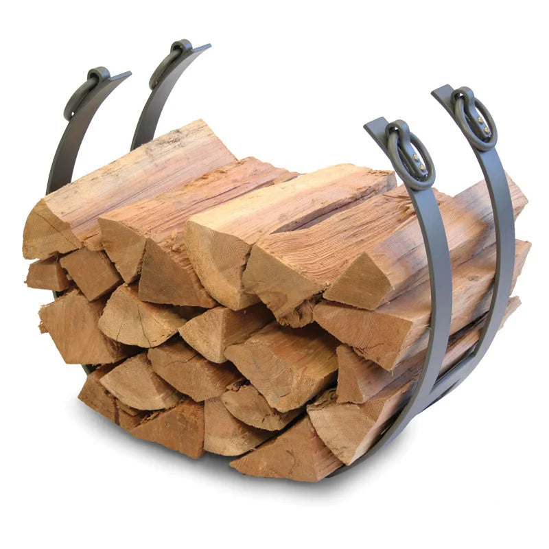 Pilgrim Markham Log Holder: Hand-forged solid steel log holder with natural iron finish, elegant arched base and minimalist frame, ideal for fireside storage and contemporary or classic interior decor.