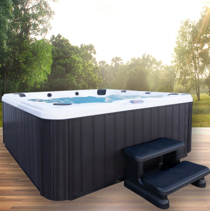 American Spas AMZ-740B 6-Person Bench Spa features 40 Halo Stainless Steel Jets, multi-colored LED lighting, and ergonomic captain's chairs for customizable full-body hydro-massage experience.