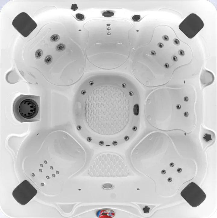 American Spas 6-Person Bench with 40 Jets: Luxurious spa featuring open bench-style seating for six adults, equipped with 40 exclusive Halo Stainless Steel Jets and multi-colored LED lighting system.