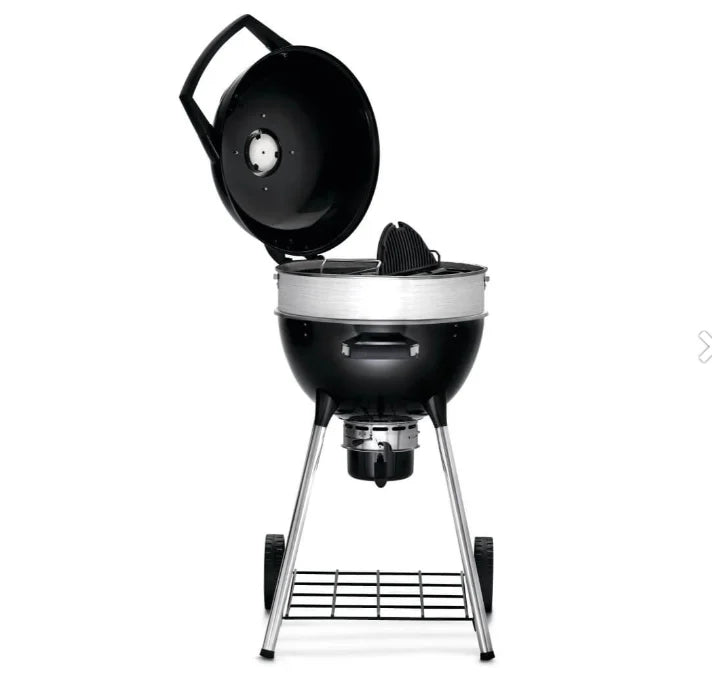 Napoleon Professional 18" Charcoal Kettle features porcelain-coated cast iron WAVE cooking grids and three adjustable height settings for precise heat control and flexibility, ideal for grilling, slow roasting, or smoking in smaller spaces.