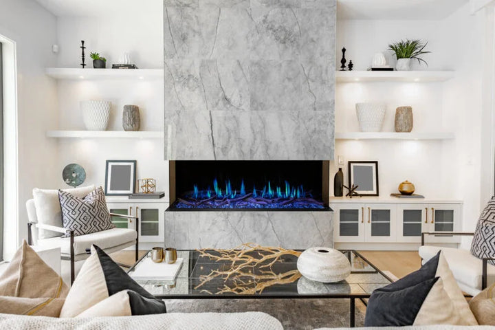 Modern Flames Orion Multi Electric Fireplace, featuring ultra-realistic flames with Heliovision Flame Technology, customizable lighting, ambient sounds, and a deep ember bed with Reflective Black Glass media and Western Driftwood logs.