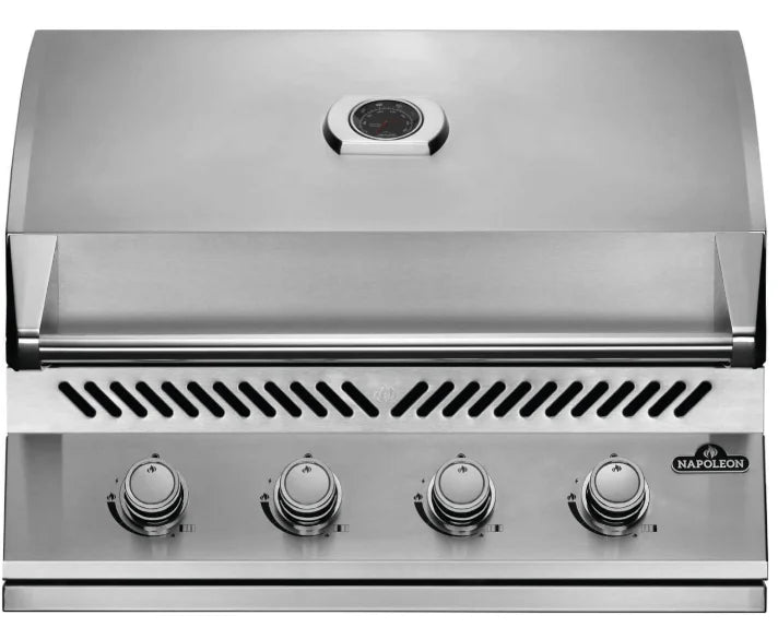 Napoleon Built-In 500 Series 32-inch Gas Grill featuring premium stainless steel construction, 7.5-mm WAVE cooking grids for even heat distribution and superior sear marks, and battery-free JETFIRE ignition system with precise temperature control via ACCU-PROBE gauge.