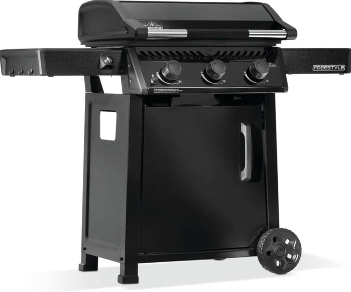 Napoleon 24" Freestyle Non-Stick Griddle with pre-seasoned steel cooktop, 3 main burners, 25,200 BTU heat output and folding side shelves.