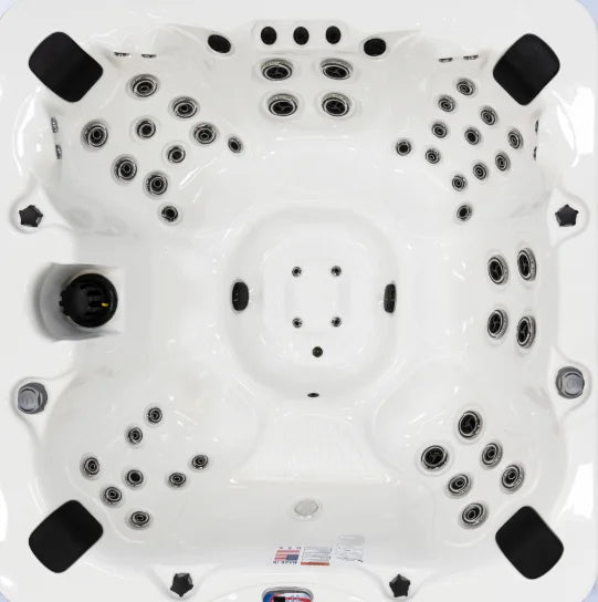 American Spas 6-Person Bench Spa features glossy white acrylic shell, 56 Halo stainless steel jets, Bluetooth sound system, LED HydroStreamers, and advanced filtration for premium hydrotherapy experience.