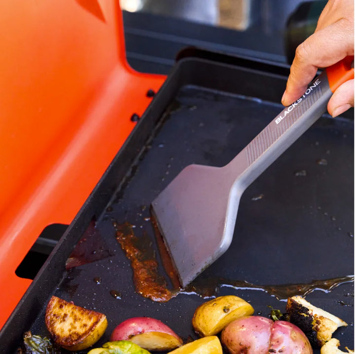 Blackstone OTG Camping Toolkit: Complete camping accessory kit for easy on-the-go cooking featuring two spatulas, one scraper, one set of tongs, and two 8 oz squeeze bottles compatible with coated Blackstone griddles.
