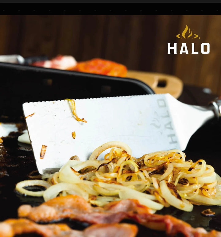 HALO 5-Piece Elite Essentials Griddle Tool Kit: Durable stainless steel griddle accessories for cooking, serving, and cleanup, including spatula, scoop spatula, blade spatula, squeegee scraper, and squeeze bottle with magnetic handles.