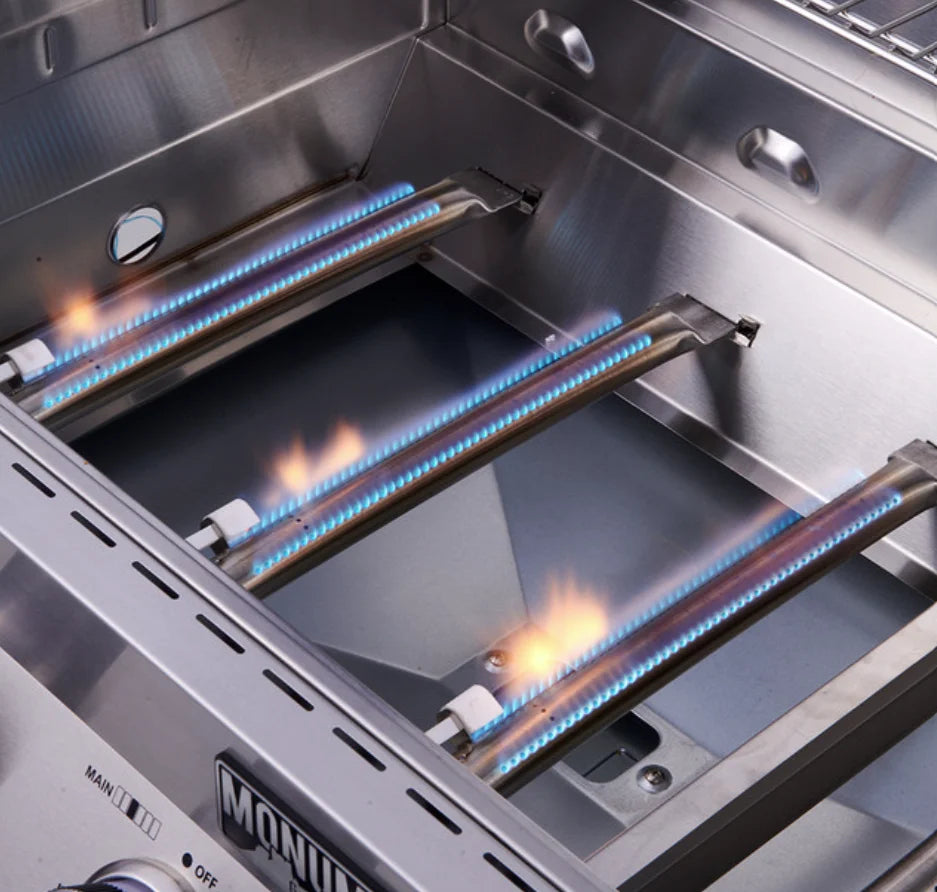 Monument Grills '77352' Stainless Steel Gas Grill with Free Rotisserie Kit - Classic Series: A premium outdoor cooking station featuring six 304 stainless steel burners, a versatile side burner, and an included rotisserie kit for unparalleled grilling power and precision.