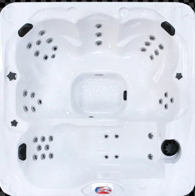 American Spas 6 Person Lounger AMZ-740L features gloss white acrylic shell, 40 stainless steel jets, LED lighting, and Whisper Hot heating for luxurious full-body massage and relaxation.