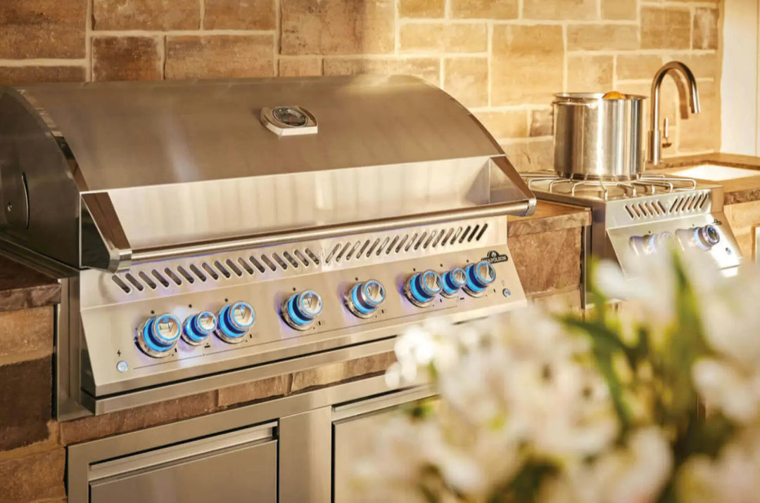 Napoleon 700 Series 44" Built-In Gas Grill features six stainless steel main burners and dual rear infrared rotisserie burners, delivering 108,000 BTUs for elite-level grilling performance.