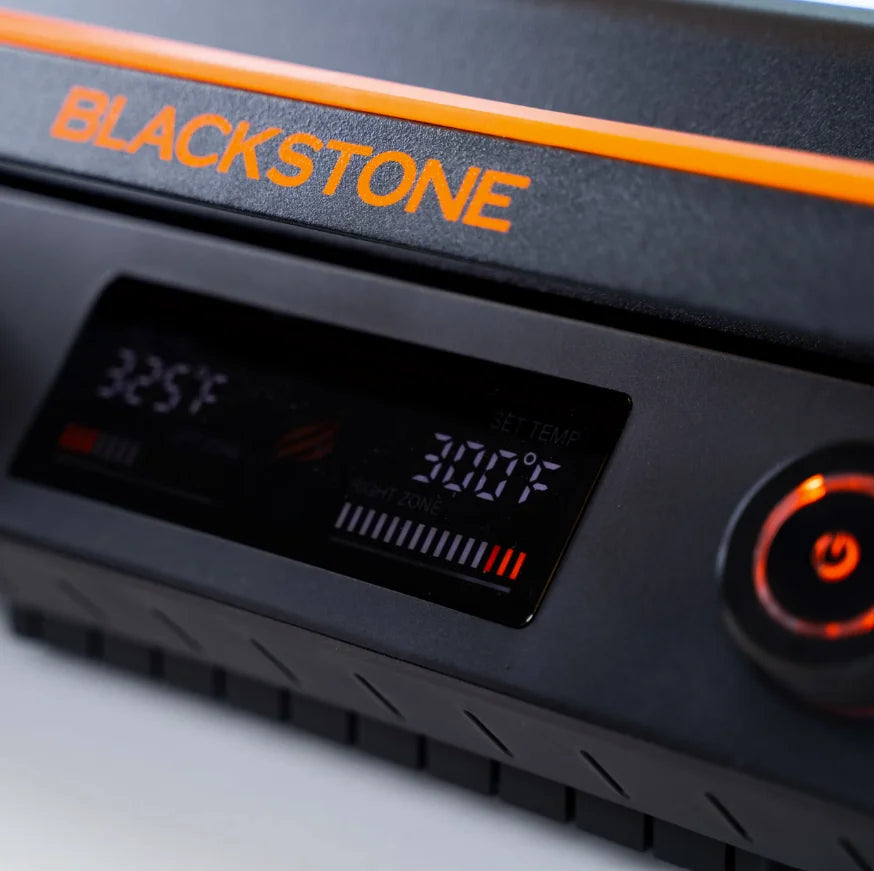 Blackstone E-Series 22" Electric Tabletop Griddle features a ceramic titanium-coated cooking surface, dual heat zones, and removable hood for versatile teppanyaki-style cooking indoors or outdoors.