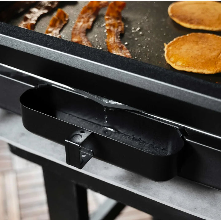 Blackstone E-Series 22-Inch Electric Tabletop Griddle features ceramic titanium-coated cooking surface, dual heat zones, and removable hood for versatile indoor or outdoor grilling convenience.