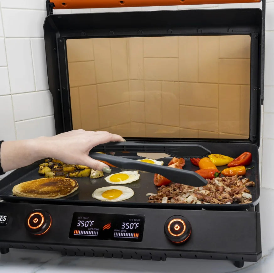 Blackstone E-Series Griddle Accessories Kit (4 Pieces) - Essential cooking tools for everyday use, includes two spatulas, one scraper, and tongs, made from heat-resistant nylon, dishwasher safe.