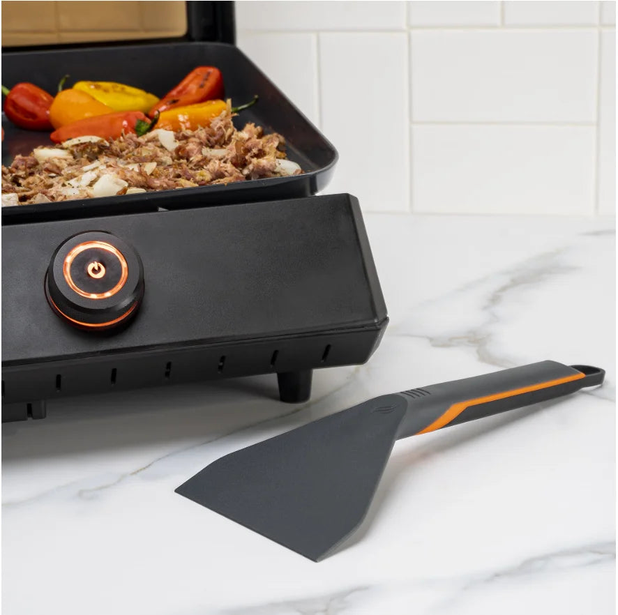 Blackstone E-Series Griddle Accessories Kit (4 Pieces) - A comprehensive griddle accessories kit designed for coated E-Series surfaces, including two heat-resistant nylon spatulas, a scraper, and tongs for effortless cooking and cleanup.