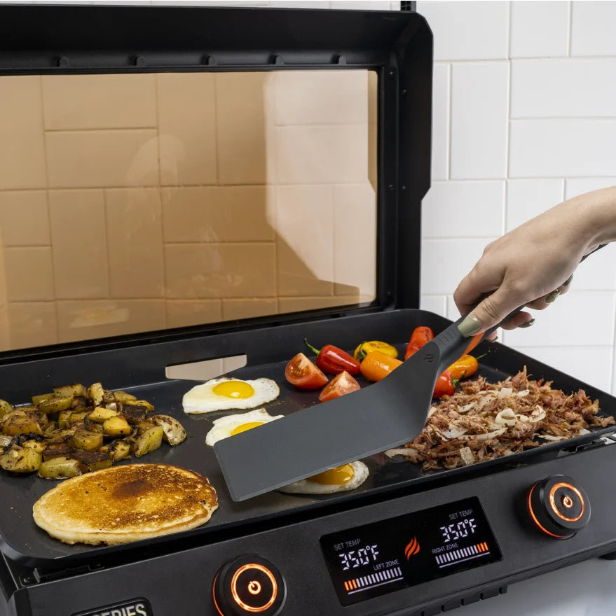 Blackstone E-Series Griddle Accessories Kit (4 Pieces) - Includes two heat-resistant nylon spatulas, a scraper, and tongs for everyday cooking on coated griddle surfaces.